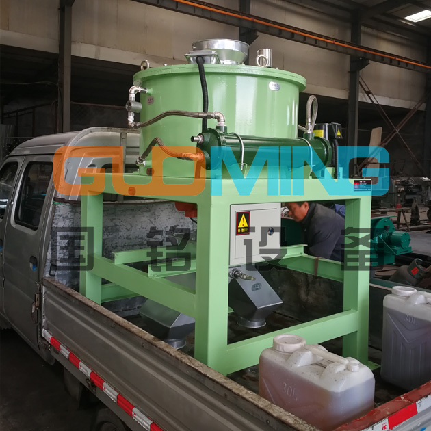 Delivery of electromagnetic dry powder iron remover for magnesium oxide